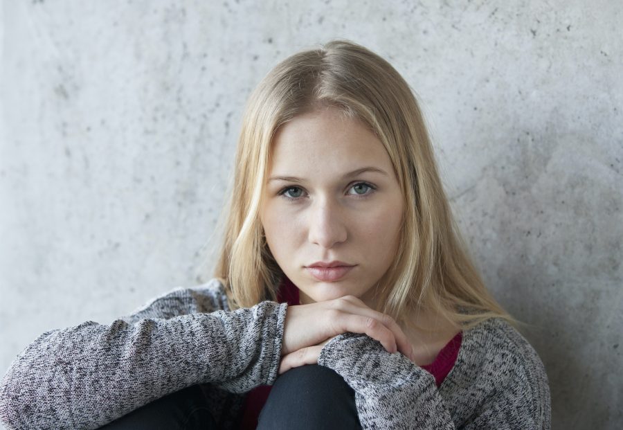 Portrait of unhappy teenage girl